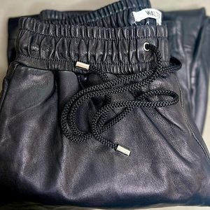 The Minh Jogger by WALTER BAKER offers a buttery soft cropped black leather pant